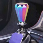 Perilla de cambio de marchas de metal con forma de diamante colorido para coche universal