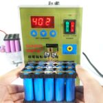 SUKKO Soldadora por puntos de batería de pulso LED + Máquina de soldadura por puntos Microordenador Micro soldadura con luz LED + Abrazadera de batería, enchufe europeo de 220 V