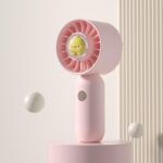 Mano sostiene pequeño ventilador portátil Mini ventilador de bolsillo, Pink Duck