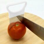 Herramientas de cocina con aguja para carne, soporte para cortador de cebolla y verduras de acero inoxidable, White