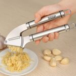 Trituradora de prensa de ajo de acero inoxidable de grado alimenticio 304