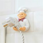 Lindo estante de cocina con gancho de resina con enchufe autoadhesivo para pared