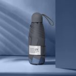 LY-0621 Paraguas de cinco pliegues y ocho huesos Paraguas de protección solar con pegamento negro simple, Eight-bone Haze Blue
