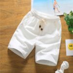 Pantalones cortos casuales sueltos de lino y algodón de cinco puntos, L