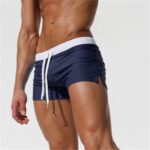 Shorts planos con bolsillo trasero Shorts de baño de playa de verano para hombres, L - Imagen 3