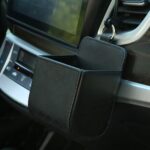 Caja de almacenamiento colgante para tarjeta de teléfono móvil multifuncional de cuero con salida de aire para coche, Black
