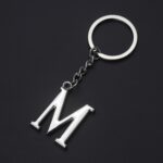 Llavero con alfabeto chapado tridimensional de doble cara, M