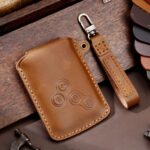 Hallmo - Funda protectora para llave de coche Renault, bolsa para guardar llaves, C185 Brown