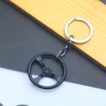 Llavero con forma de volante de coche, colgante de llave extraíble