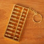 Llavero con dije de ábaco de aleación de zinc bañado en oro y con dije diario, 9cm with Keychain