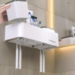 Estante para cepillos de dientes de hotel con soporte de pasta de dientes montado en la pared de escritorio de doble taza - Imagen 7